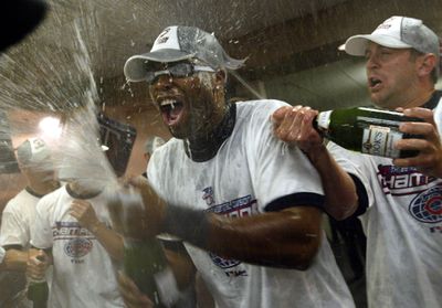 9/20/04- Minnesota Twins vs. Chicago White Sox in Chicago and U.S> Celuular Field. - Twins center fielder Tori Hunter, wearing goggles, was the Twins player best prepared for the spray of champagne in the clubhouse following the team’s 8-2 victory over t