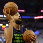 May 30, 2024; Minneapolis, Minnesota, USA; Minnesota Timberwolves center Rudy Gobert (27) warms up before game five of the western conference finals for the 2024 NBA playoffs against the Dallas Mavericks at Target Center. Mandatory Credit: Bruce Kluckhohn-USA TODAY Sports