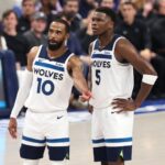 May 28, 2024; Dallas, Texas, USA; Minnesota Timberwolves guard Anthony Edwards (5) and guard Mike Conley (10) speak during the second quarter against the Dallas Mavericks in game four of the western conference finals for the 2024 NBA playoffs at American Airlines Center. Mandatory Credit: Kevin Jairaj-USA TODAY Sports