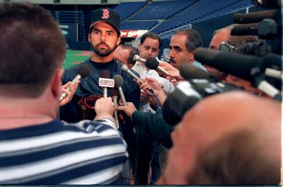 baseball player Rick Aguilera in Boston uniform, holding news Conference // The new Boston Red Sox closer Rick Aguilera met the media before Friday night’s (7-7-95) game at the Metrodome